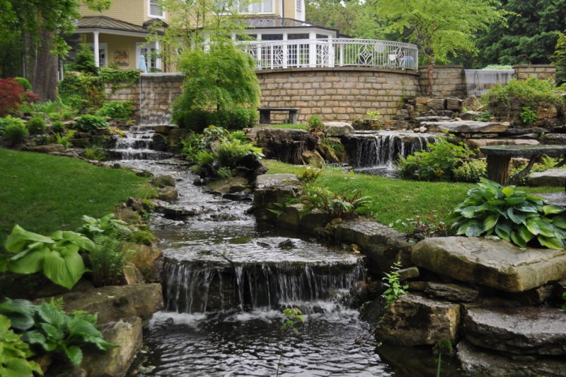 paysagiste-LA TURBIE-min_landscaping-rock-louisville-ky-traditional-landscape-and-boulders-brick-wall-bushes-grass-koi-law